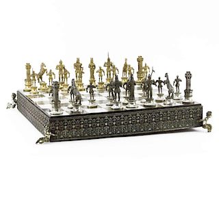 Giuseppe Vasari Italian, circa 1970 gilt metal figural chess set