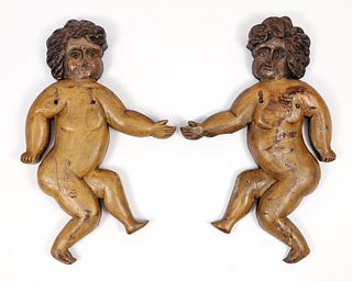 Polychromed wood left and right facing Cherubs
