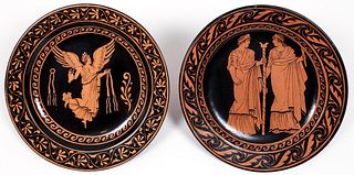 Two Giustiniani plates with stylized floraform borders