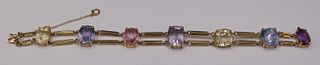 JEWELRY. 14kt Gold and Colored Gem Bracelet.