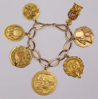 JEWELRY. 14kt Gold Charm Bracelet with (7) Charms.
