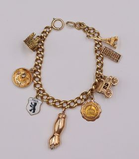 JEWELRY. 14kt Gold Bracelet with (8) Gold Charms.