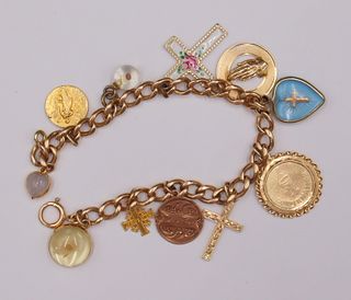 JEWELRY. 14kt Gold Bracelet With (10) 14kt Charms.