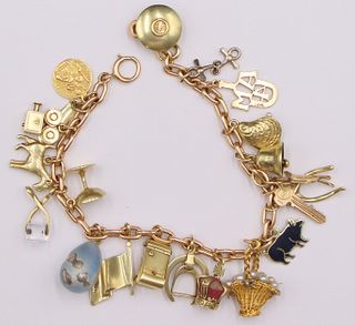 JEWELRY. 14kt Gold Bracelet with (20) Gold Charms.