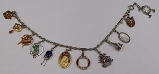 JEWELRY. Exceptional 14kt Gold Charm Bracelet with
