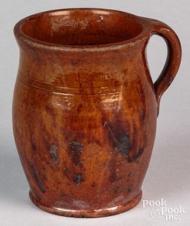 Pennsylvania redware handled jar, 19th c., with ma