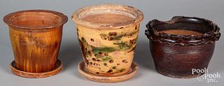 Three Pennsylvania and Virginia redware flowerpots