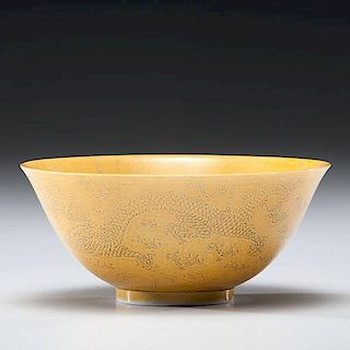 A Chinese Yellow Glazed Incised Dragon Bowl, Xuantong Mark and Period 