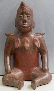 Terracotta or Clay Figure Of A Seated Man.
