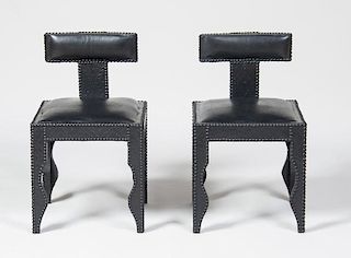 PAIR OF BRASS-STUDDED LEATHER KLISMOS CHAIRS