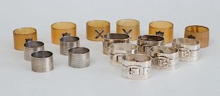 SET OF SEVEN SILVER-PLATED "BELTED" NAPKIN RINGS, FOUR SILVER-PLATED RINGS WITH WAVED BANDS, AND SIX FAUX HORN RINGS WITH SILVER-PLATED SHIELDS OR X'S