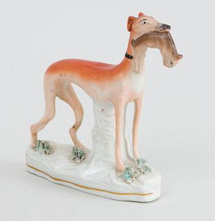 STAFFORDSHIRE POTTERY WHIPPET WITH A RABBIT
