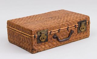 CHINESE BRASS-MOUNTED WICKER CASE WITH WROUGHT-IRON DROP HANDLE