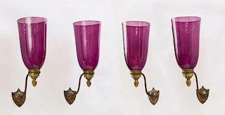 SET OF FOUR GEORGE III BRASS SINGLE-LIGHT WALL SCONCES, WITH AMETHYST GLASS SHADES
