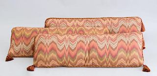 SET OF THREE TASSELED BOLSTER PILLOWS IN THE HUNGARIAN STICK PATTERN