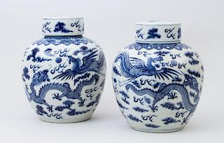 TWO CHINESE BLUE AND WHITE PORCELAIN GINGER JARS AND COVERS