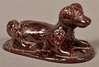 Breininger Pottery 1967 Reclining Dog.