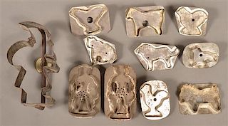 Eleven Antique Tin Figural Cookie Cutters.