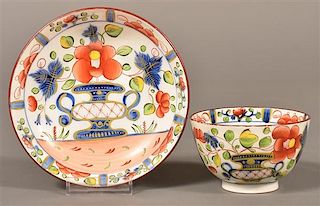 Gaudy Dutch China Urn Pattern Cup and Saucer.