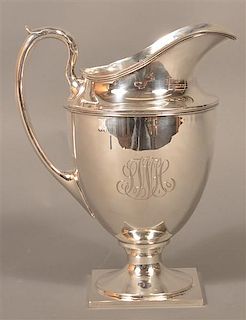 Sterling Silver Footed Water Pitcher.