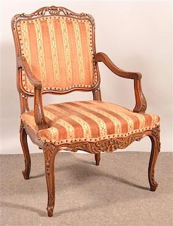 Antique Louis XV Style Carved Armchair.