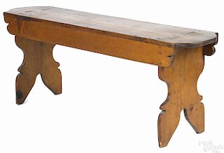 Mortised pine bench late, 19th c., with a scalloped seat and ends, 18'' h., 48'' w.