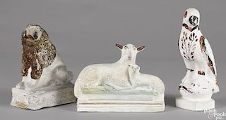Three pieces of Pennsylvania chalkware, 19th c., to include a dog, a sheep and lamb, and a parrot
