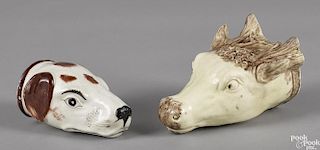 Two Staffordshire stirrup cups, 19th c., of a hound and a bull, 4 1/2'' h. and 5 1/2'' h.