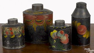 Four toleware tea caddies, 19th c., retaining their original polychrome decoration