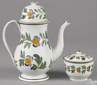 Pearlware coffee pot and matching sugar, 19th c., with acorn decoration, 11 1/2'' h. and 4 1/4'' h.
