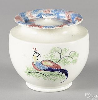 Unusual spatter covered sugar with a red and blue rainbow rim and bird variant on body, 4 1/2'' h.