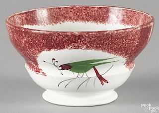 Red spatter waste bowl with a parrot, 3 1/8'' h., 5 5/8'' dia.