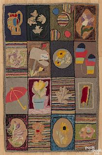 Pennsylvania hooked rug, 20th c., with sixteen panels of various scenes, including mittens