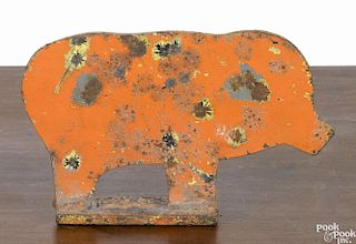 Sheet iron carnival pig target, early 20th c., retaining an old orange over yellow surface