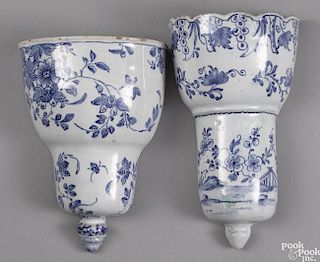 Two Delft blue and white wall pockets, 18th c., 6 7/8'' h. and 7 5/8'' h.
