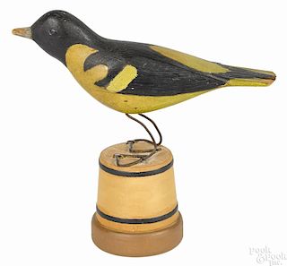 Painted pine song bird, early 20th c., mounted on a later turned wood stand, 7 1/4'' h.