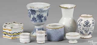 Eight Delft tablewares, 18th c., tallest - 5''. Provenance: The Collection of Frank and Sue Watkins