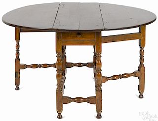 New England William & Mary birch and maple gateleg table, ca. 1740, 26 1/2'' h., 15'' w., 43 1/4'' d.