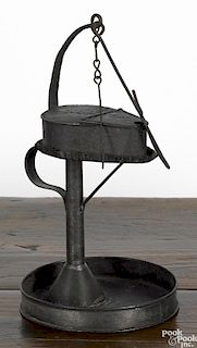 Tin fat lamp and stand, 19th c., 12'' h. Provenance: The Collection of Frank and Sue Watkins