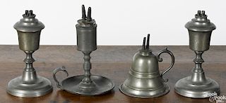 Four American pewter whale oil lamps, 19th c., to include a pair by Roswell Gleason and two others
