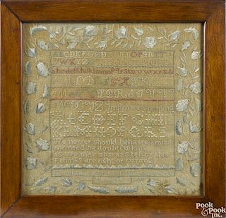 New England silk on linen sampler, dated 1834, wrought by Caroline Ayer, 15 1/2'' x 16''.