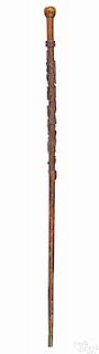 Carved maple walking stick, late 19th c., with high relief decoration of a horse, a rooster