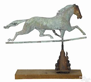 Large full-bodied copper running horse weathervane, 19th c., with a cast zinc head