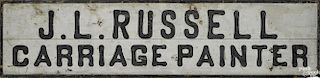 Painted pine trade sign, ca. 1900, for J.L. Russell Carriage Painter, 21 3/4'' x 91''.