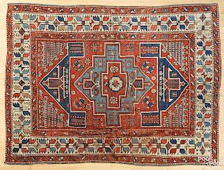 Kazak carpet, early 20th c., 7'4'' x 5'6''.