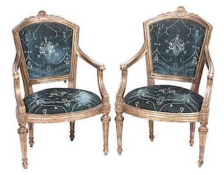 A Pair of Louis XVI Style Giltwood Fauteuils Height of each 39 1/4 inches.