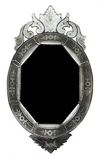A Venetian Mirror Height 41 x width 23 1/4 inches.