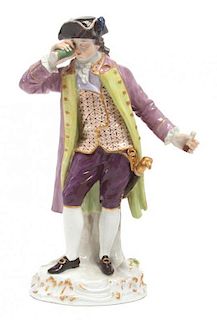 * A Meissen Porcelain Figure Height 8 1/4 inches.