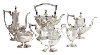 * An American Silver Tea Service, Gorham, Providence, RI, comprising a kettle on stand, teapot, two coffee pots, creamer, covere