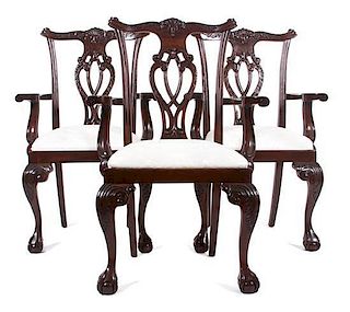 A Set of Four Chippendale Style Armchairs Height 40 inches.